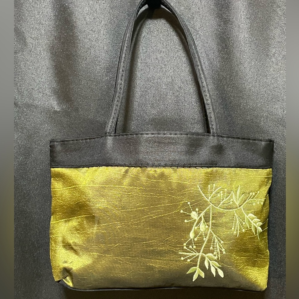 Beautiful hand-embroidered handbag in rich green color